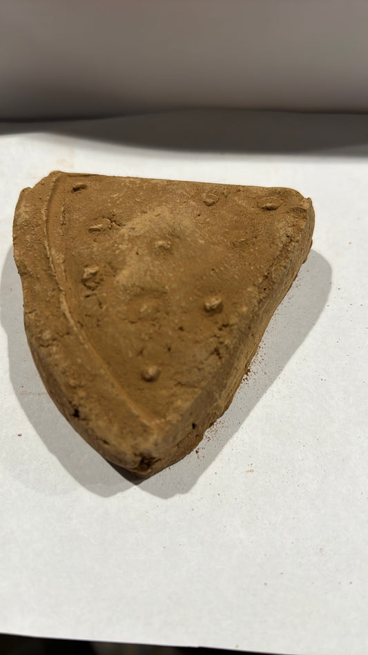 Pieza de barro en forma de sandia